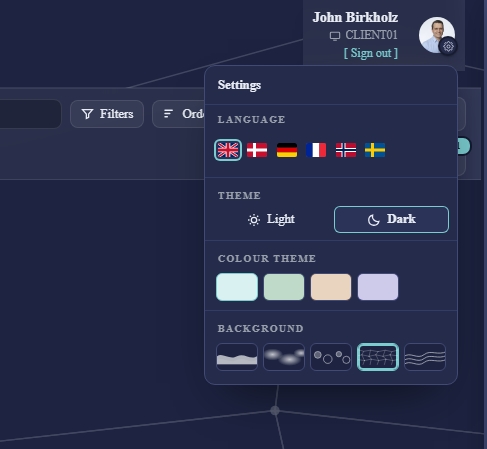 The shop's settings panel with a Colour theme group of swatches, beside the existing language, theme and background groups